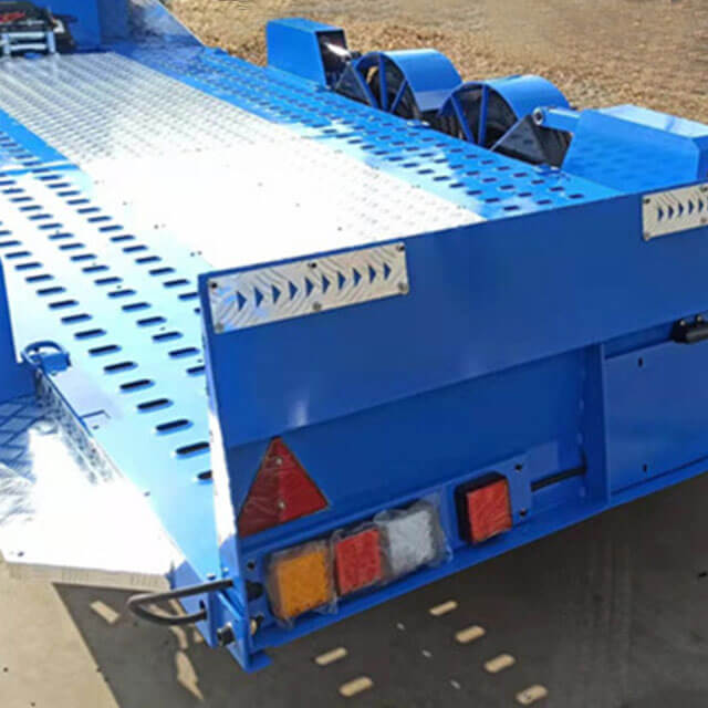 The drop deck trailer improves the efficiency of transporting heavy equipment