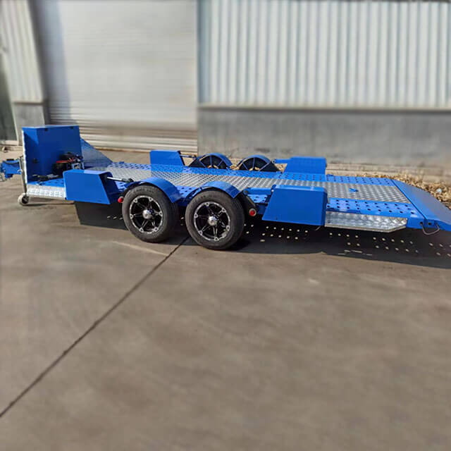 The trailer's drop deck feature allows for lower loading angles