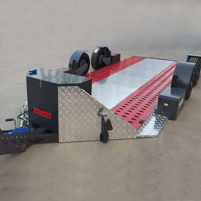 The drop deck trailer is versatile and can carry a variety of equipment