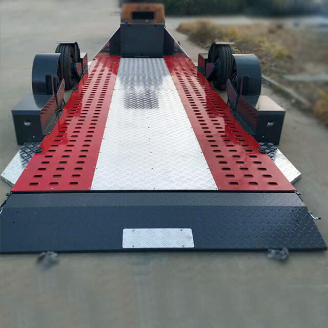 The drop deck trailer is built to withstand heavy loads and wear