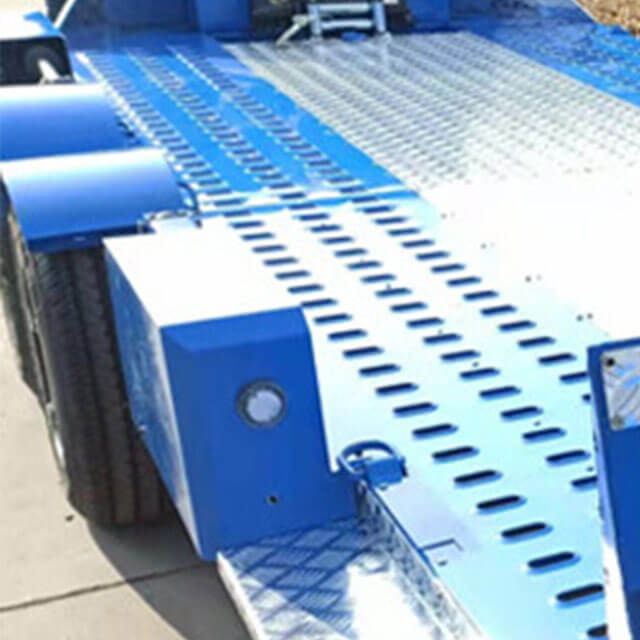 The drop deck trailer is adaptable and can be used to transport a wide range of equipment