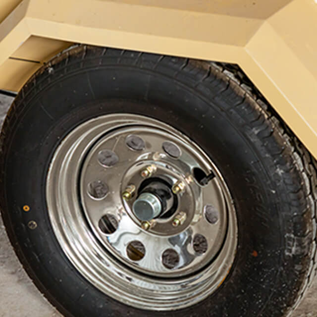 The off-road camper trailer is designed for rugged terrain.